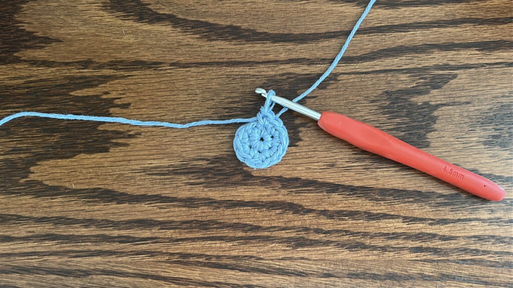 Increase stitches worked into magic ring for crochet bucket hat shaping