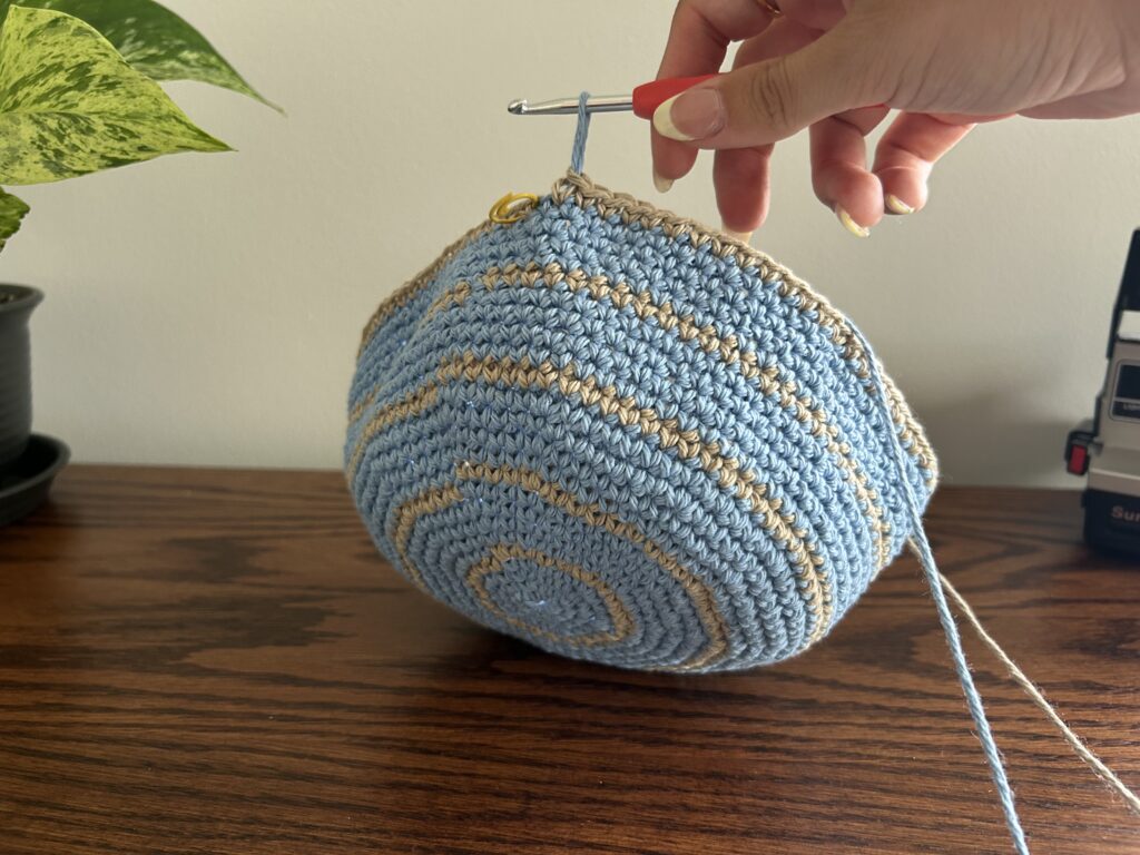 Crochet bucket hat switched to blue cotton yarn after single crochet round