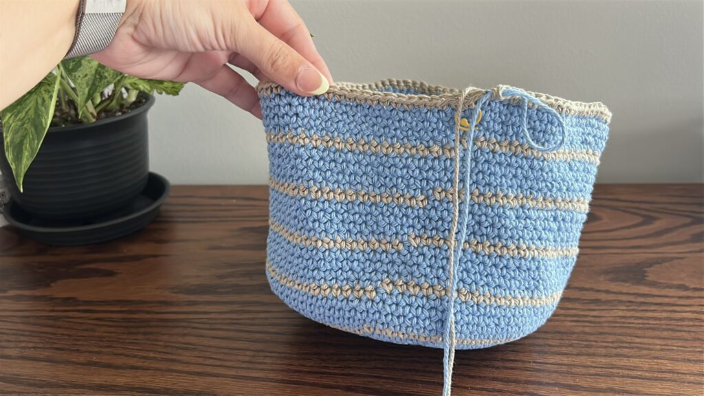 Last stripe on bucket hat in tan cotton yarn