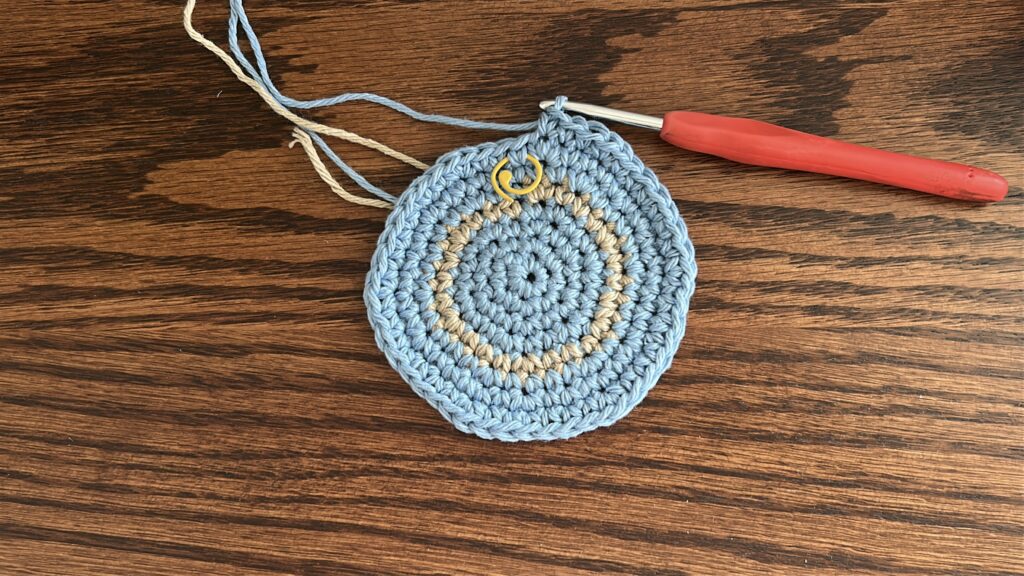 Striped crochet bucket hat before second stripe along the crown of the hat